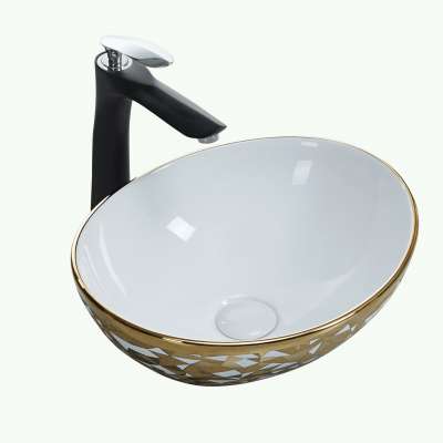 Popular design sanitary ware oval shape plating gold bathroom ceramic wash hands counter basin